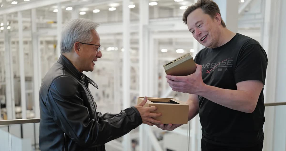 Elon Musk and Jensen Huang with the NVIDIA DGX Spark, a compact AI supercomputer, at SpaceX Starbase.