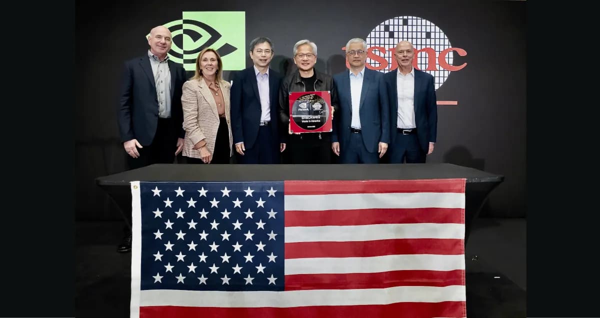 NVIDIA Blackwell US production wafer being signed by Jensen Huang and Y.L. Wang at TSMC Phoenix facility, symbolizing domestic AI chip manufacturing.