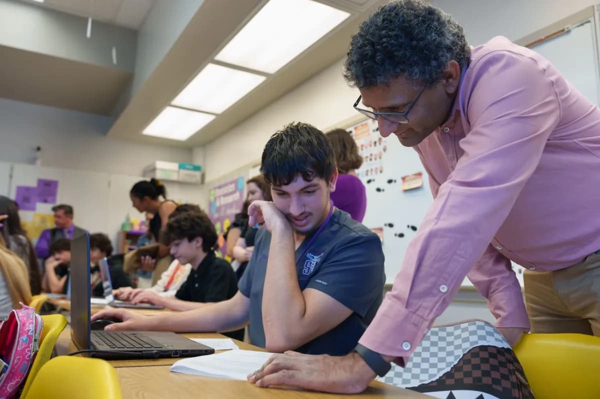 Students and educators engaging with AI tools in a classroom setting, representing Miami AI education initiatives.