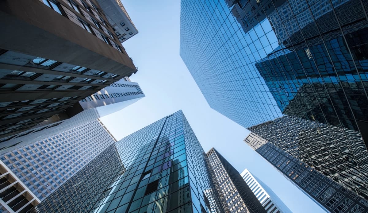 A small business owner using AI software on a tablet, demonstrating how AI for small business enhances efficiency and growth.