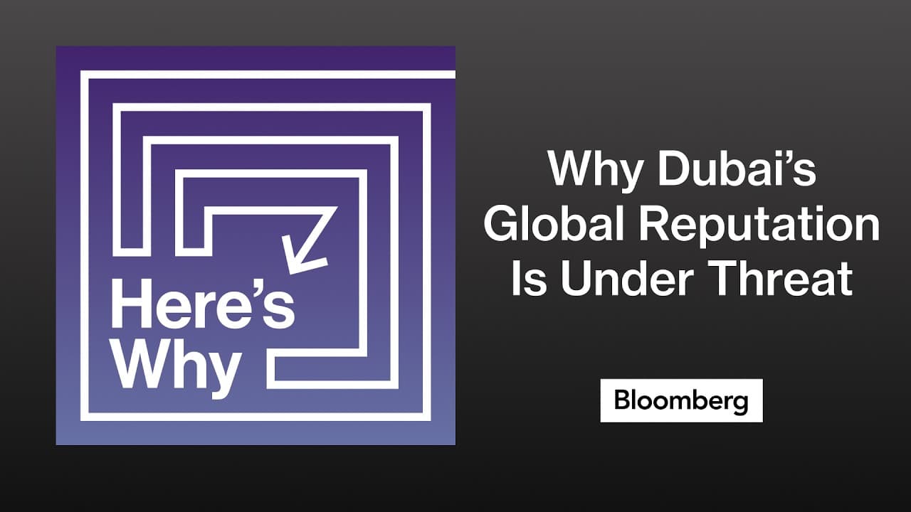 Bloomberg 'Here's Why' podcast logo with waveform audio visualization
