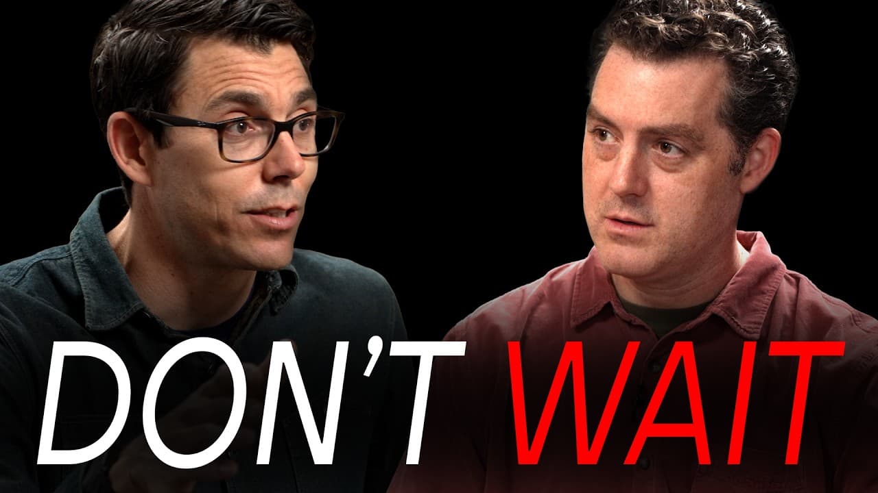 RJ Scaringe, CEO of Rivian, speaking in an interview setting.